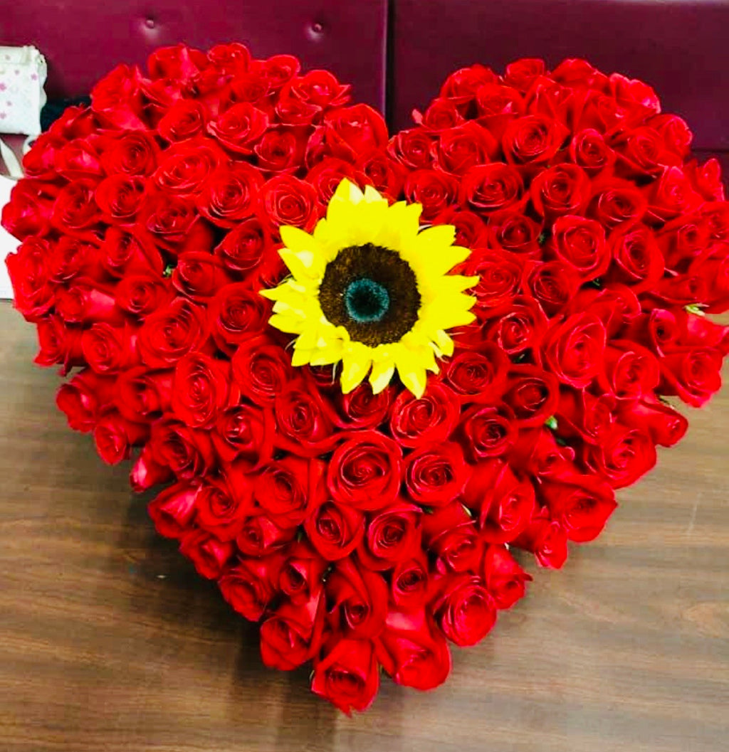 50 Roses in Heart box with 1 sunflower